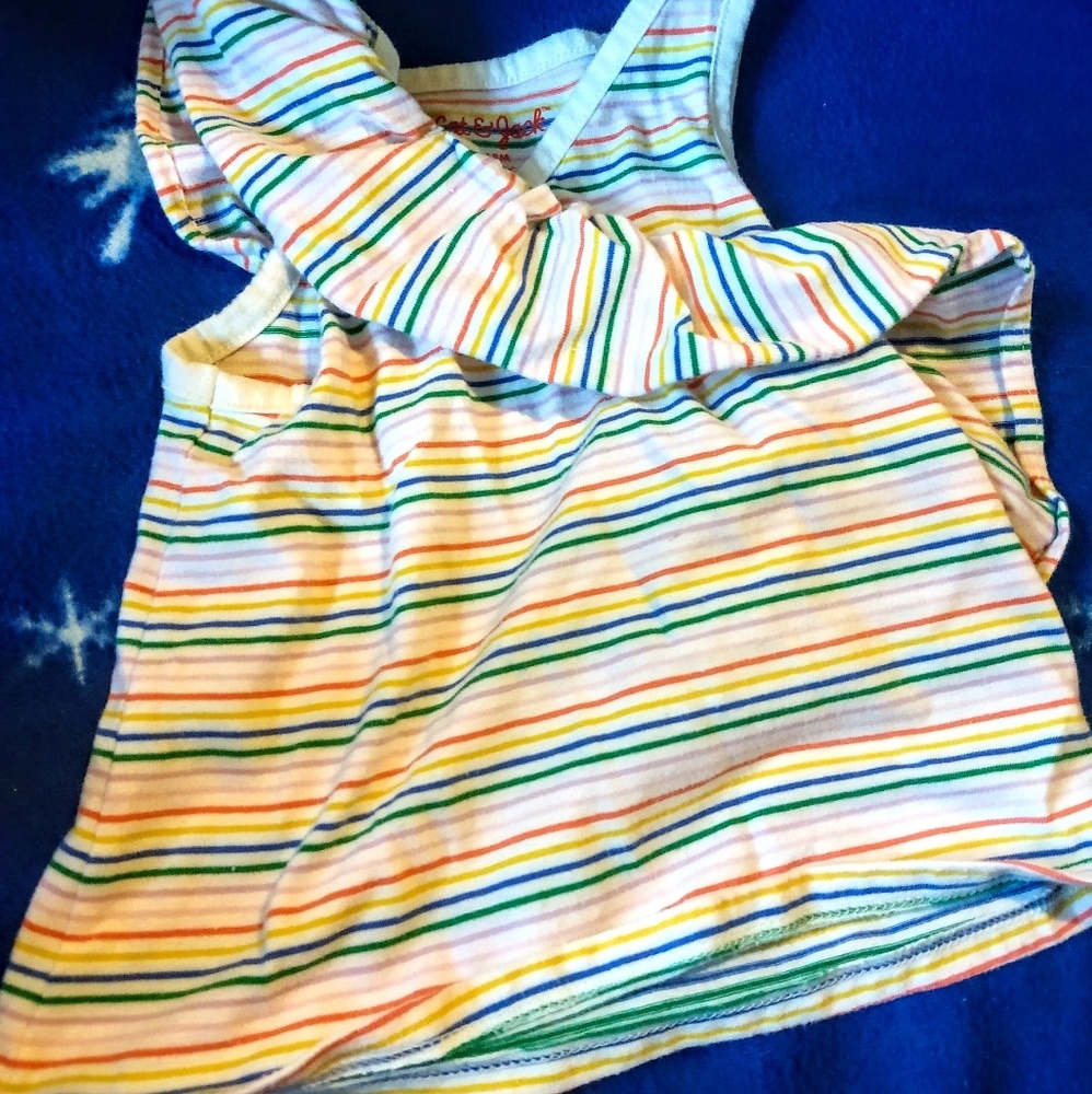 Rainbow striped tank top with ruffle across front